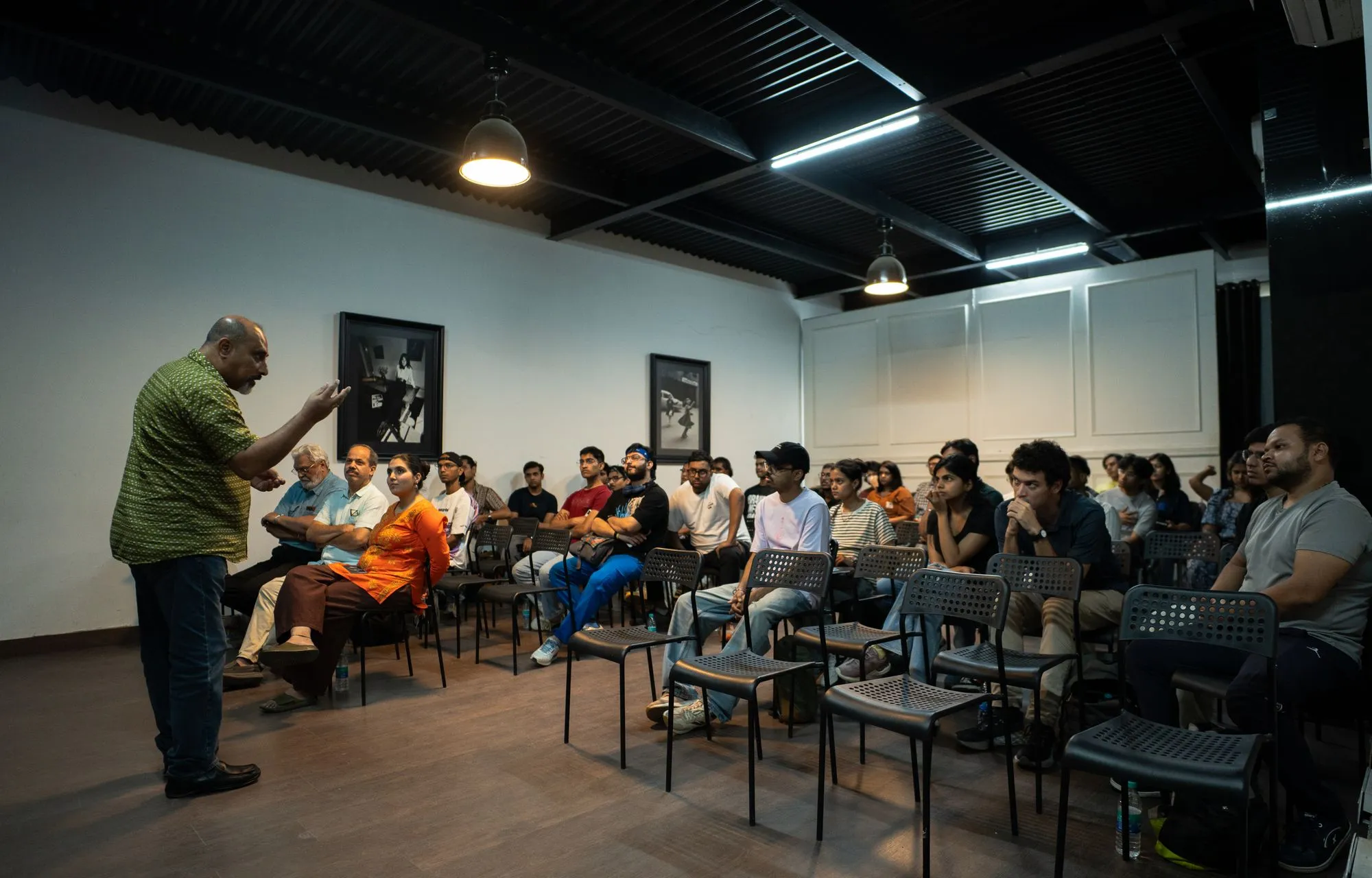 Participants listening to a speaker at a professional workshop